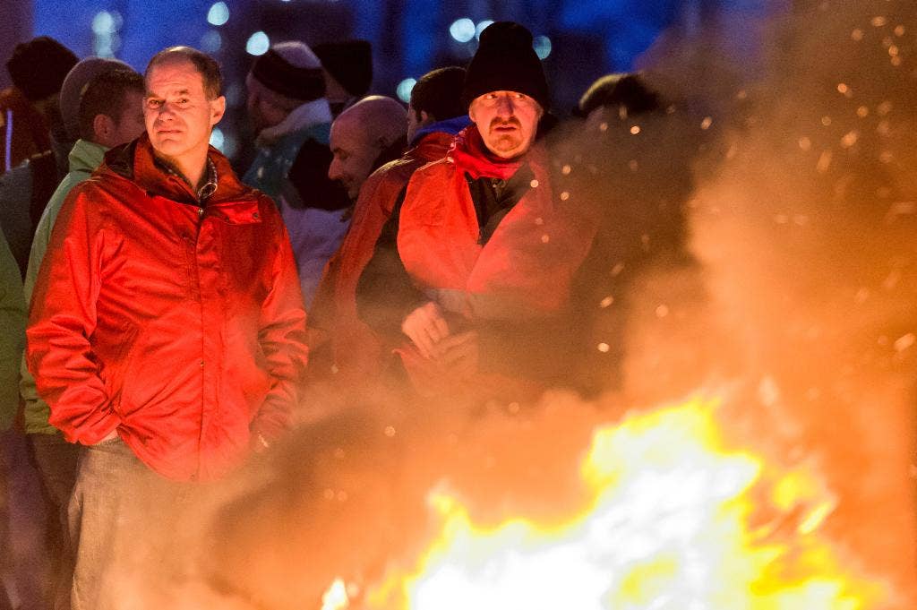 Belgian strike paralyzes Antwerp port, rush hour traffic. More action until Dec. 15
